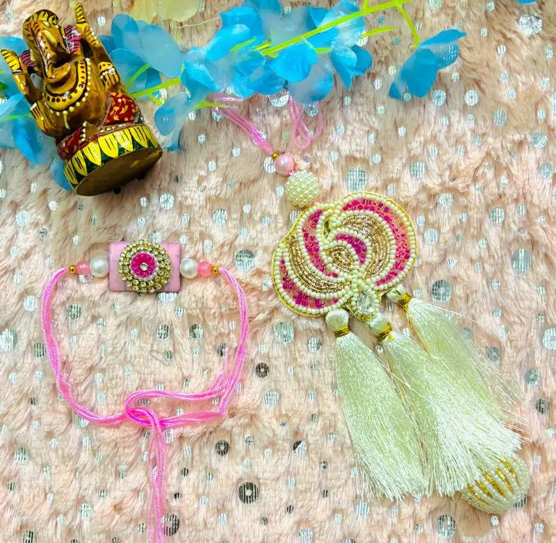 Elegant bhaiya bhabhi rakhi set with beads and tassels