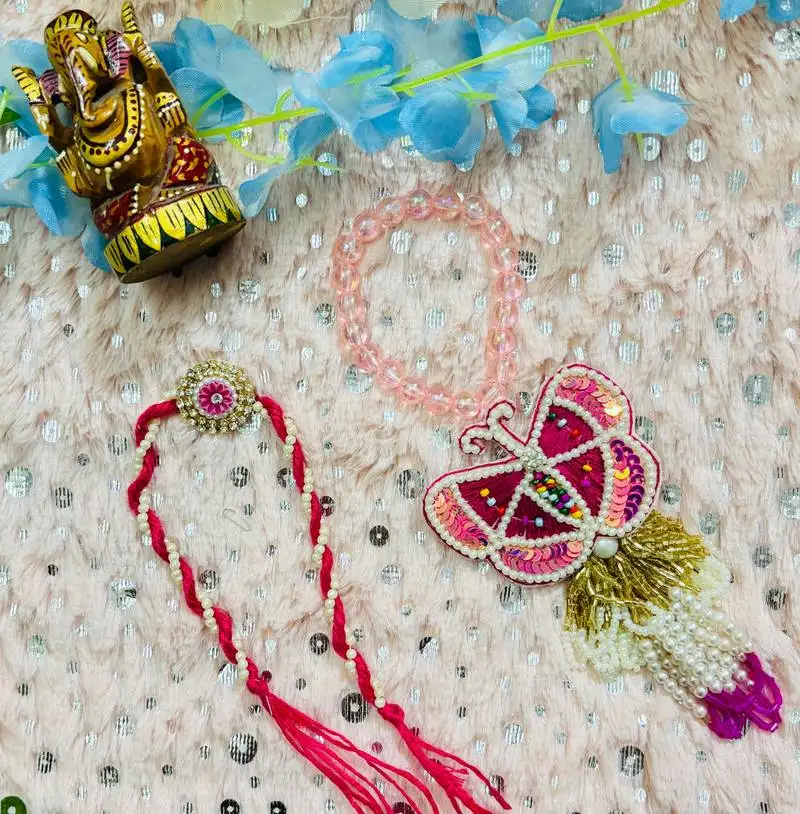Butterfly bhaiya bhabhi rakhi set with beads, sequins & floral motif
