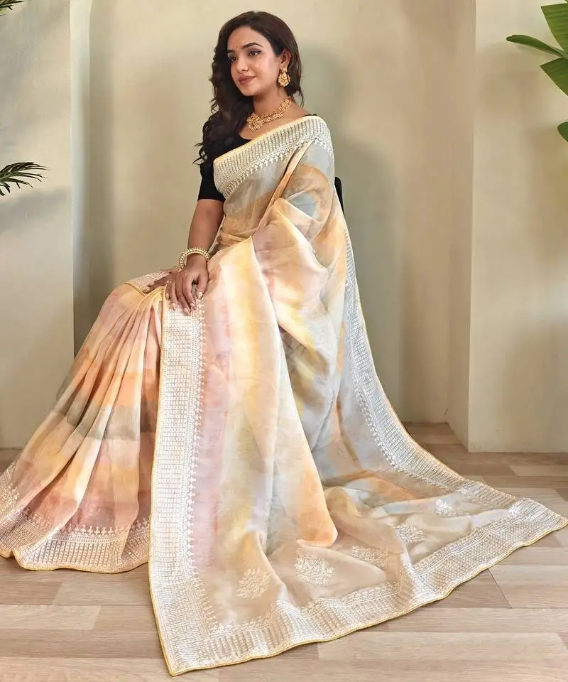 Yellow organza saree with digital print and sequins embroidery