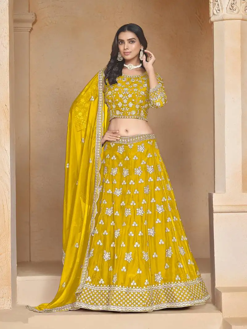 Yellow embroidered resham zari sequins organza lehenga