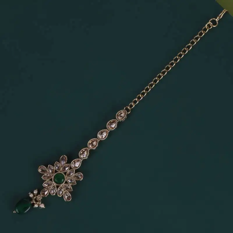 Lavish flower and oval shape gold plated maang tikka for women and girls