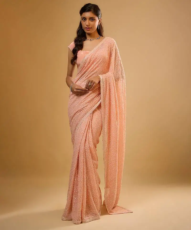 Peach embroidered georgette saree