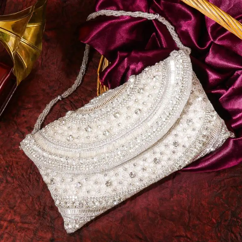 Orlina – premium hand embroidered designer clutch by osty-white