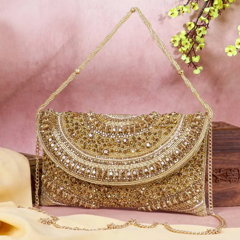 Orlina – premium hand embroidered designer clutch by osty-gold