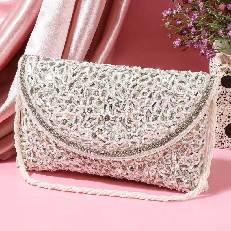 Osty roshni – premium hand zari embroidered bridal clutch with dual handle options-white