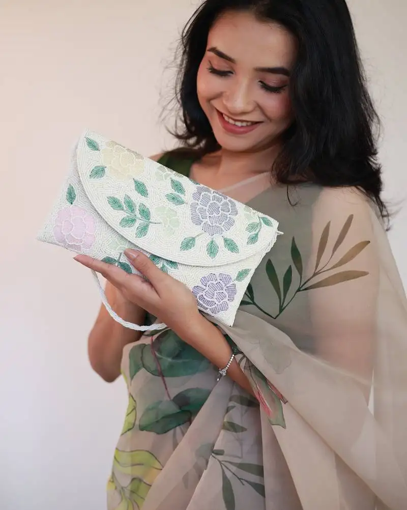 Osty lush – floral hand zari beaded clutch with dual handle | ivory base pastel embroidery bag- multy