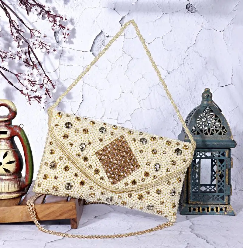 Osty aurelia – handcrafted diamond zari clutch with dual handle-gold