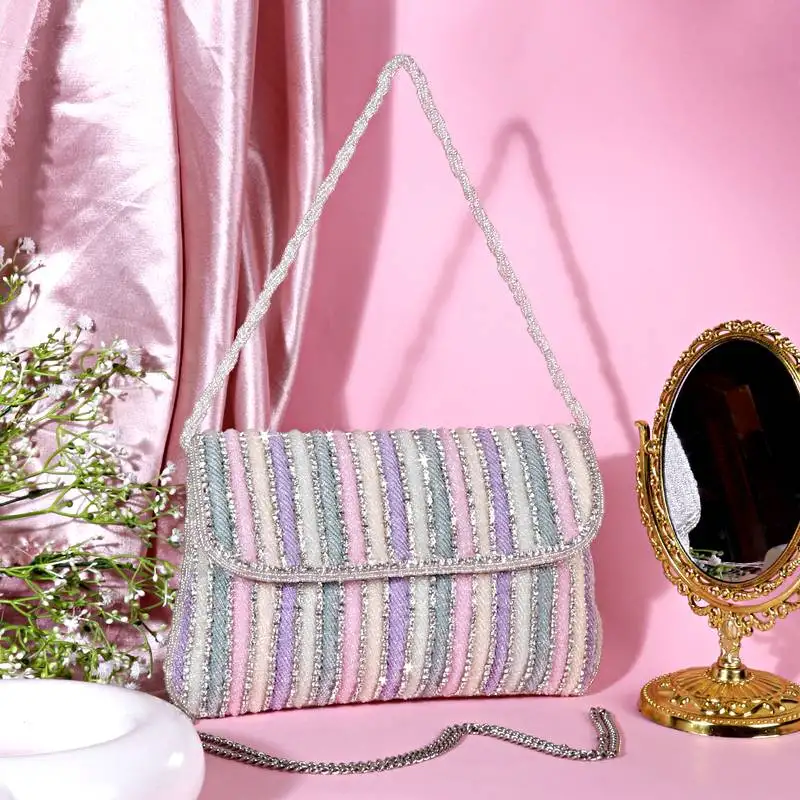 Osty luminara – handcrafted pastel zari clutch with dual handle-gold
