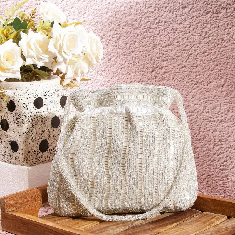 Luxury handcrafted bridal potli bag for women - golden glam embellished zari beaded purse-silver