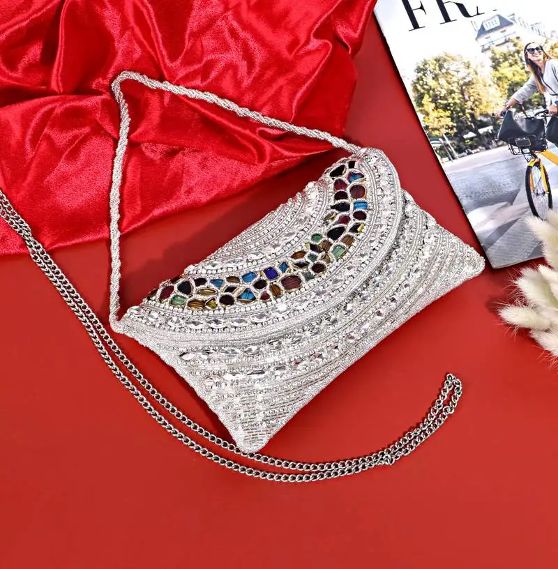 Osty celestia – handcrafted with multicolor gem embellishment & dual carry chain for wedding & occasion styling-silver