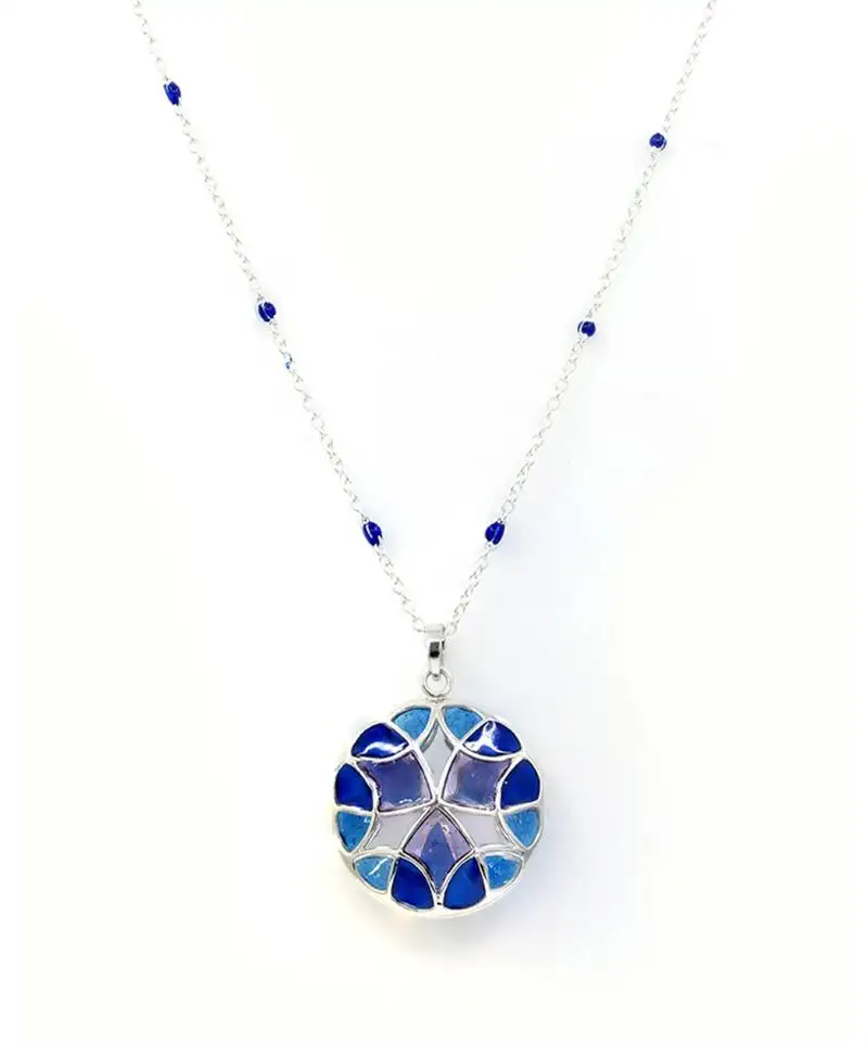 Blue stone pendant necklace in sterling silver