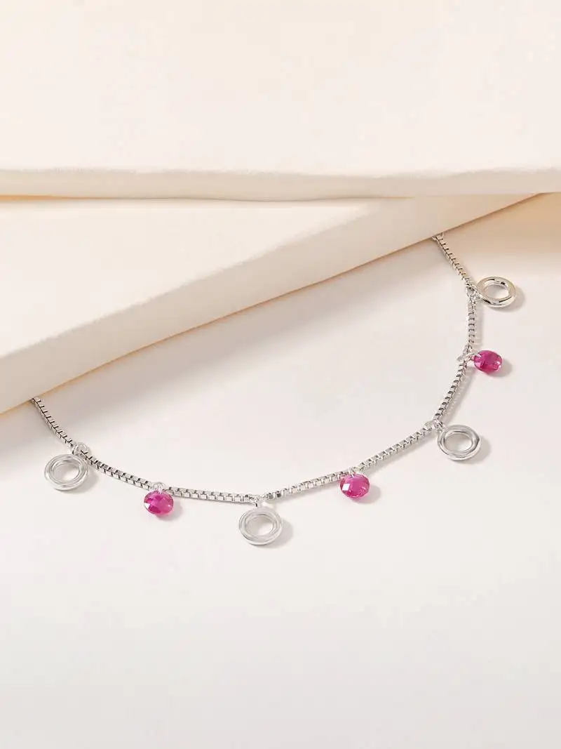 Pink bead and circle charm bracelet