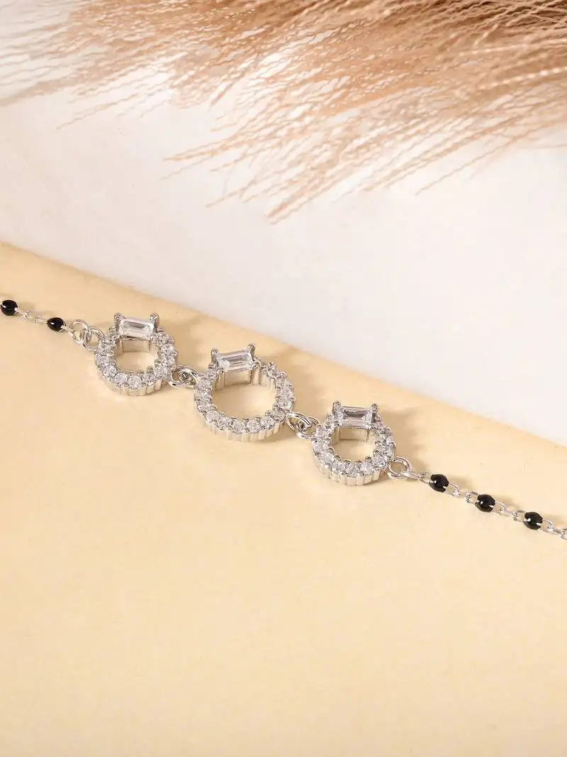 Three-stone black beads bracelet