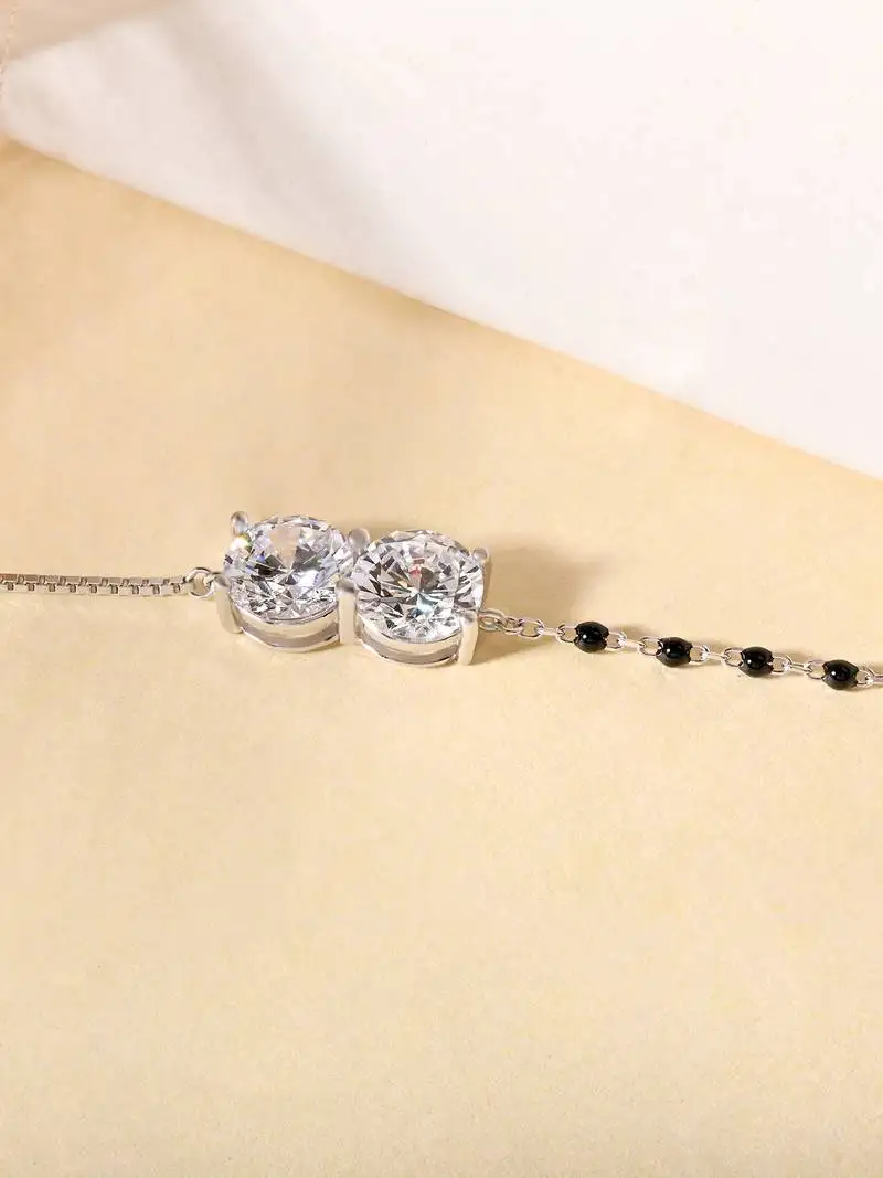 Twin solitaire black beads bracelet