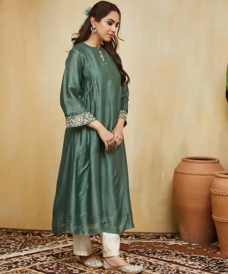 Green plain chanderi kurti with delicate embroidery