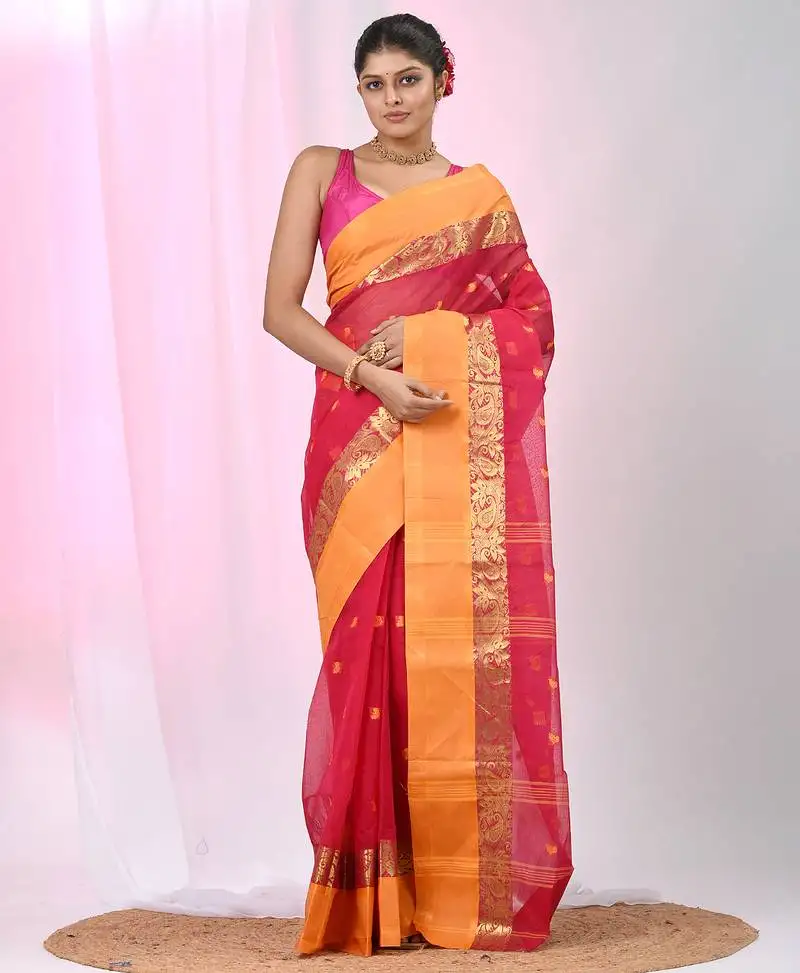 Stylish pink tant saree with yellow and gold border