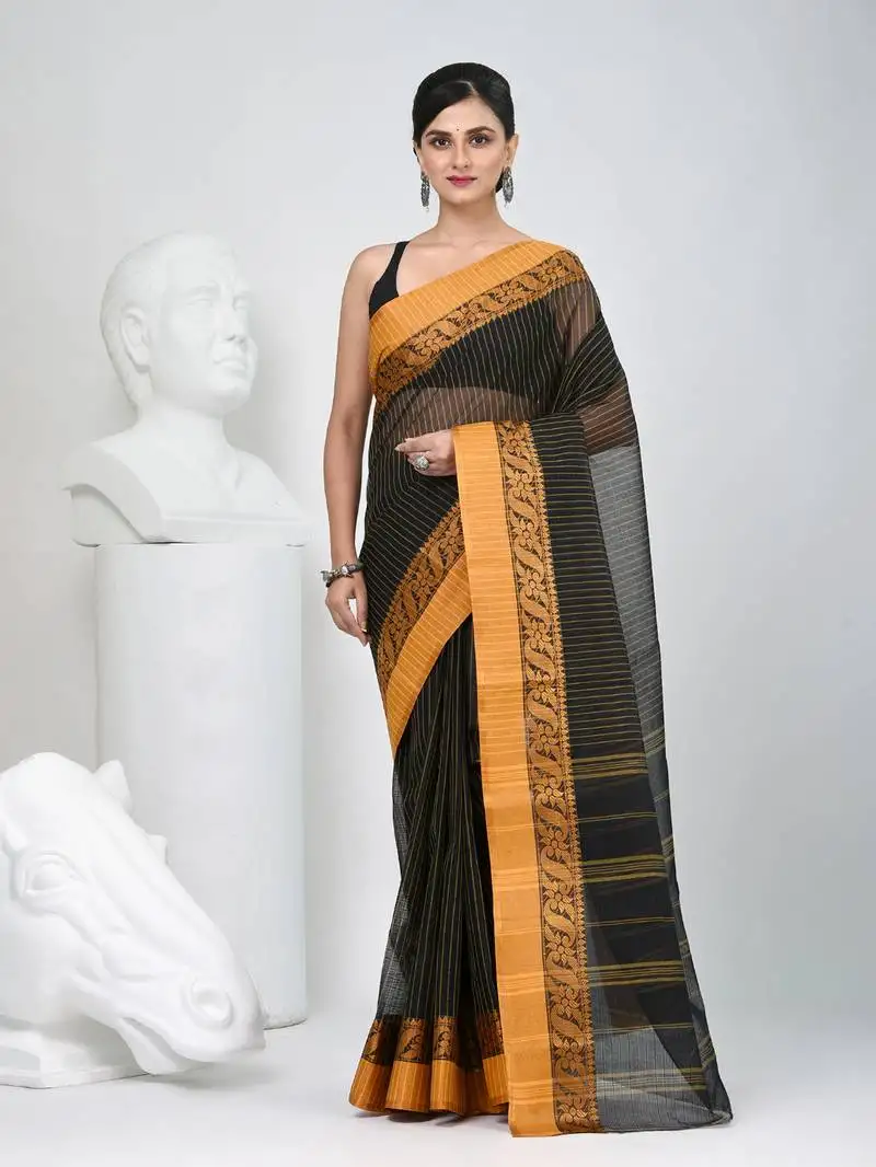 Classic black and mustard striped tant saree with intricate borders