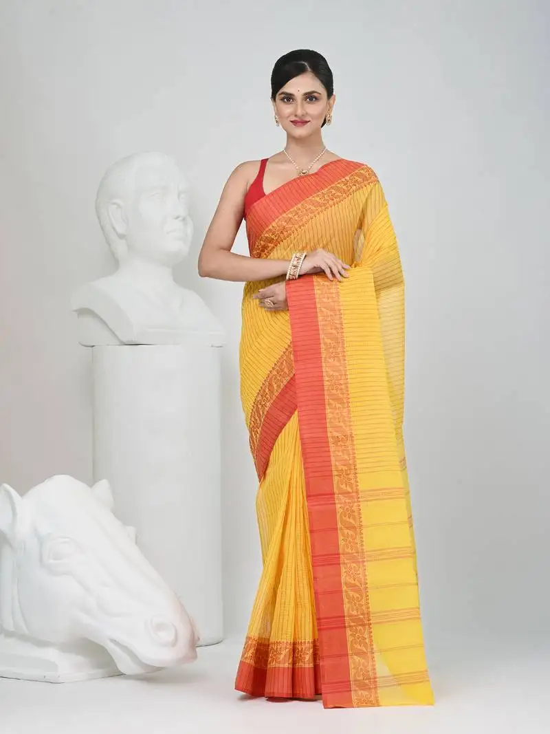 Classic yellow and red striped tant saree with intricate borders