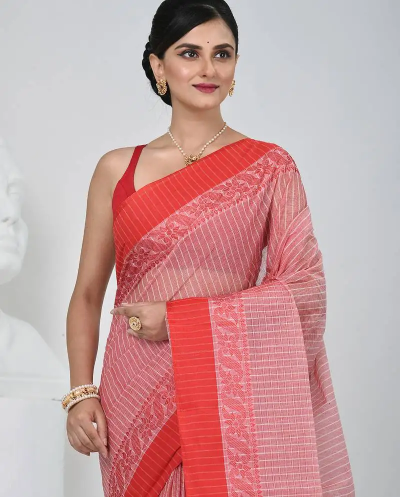 Elegant red and white checked tant saree with floral lace border