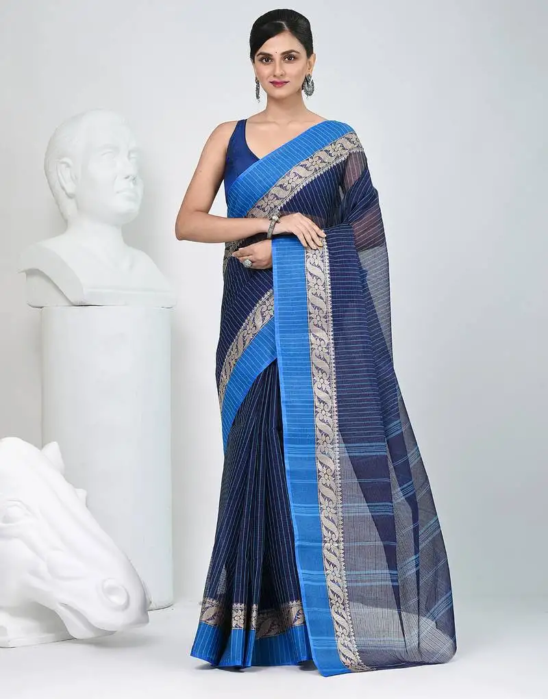 Stunning navy blue and blue striped tant saree with floral lace border