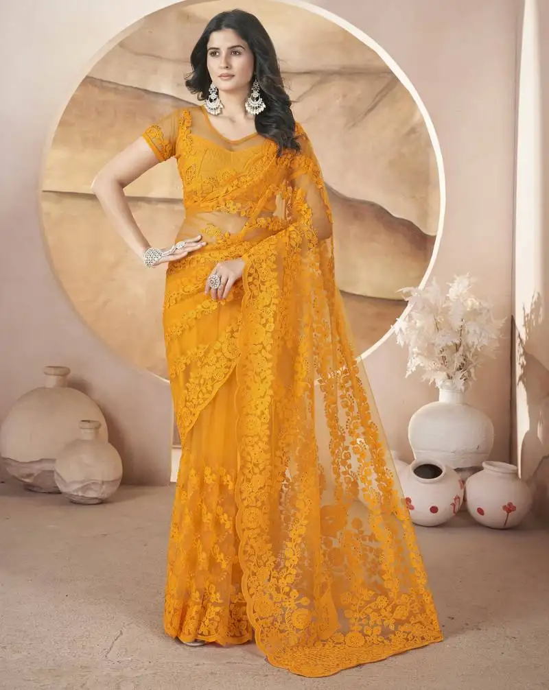 Yellow butterfly net thread embroidery with stone work saree
