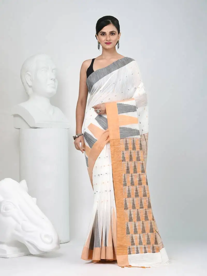 Off white handspun cotton saree with geometric motif and bright hues