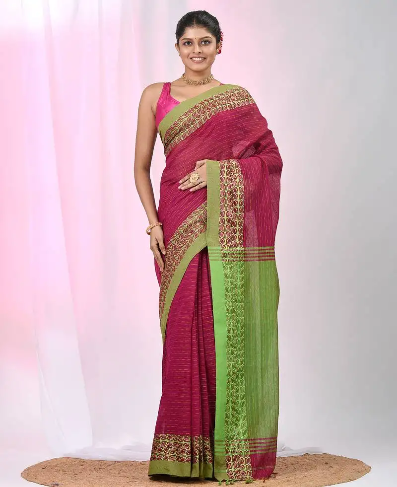 Fuchsia and green handspun cotton saree with vibrant borders