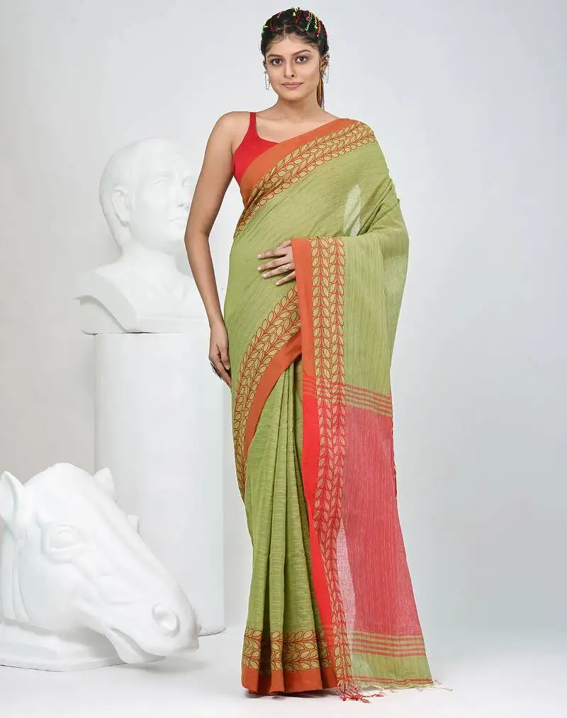Green and red handspun cotton saree with vibrant borders