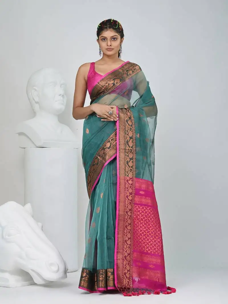 Elegant teal and fuchsia resham saree with zari border