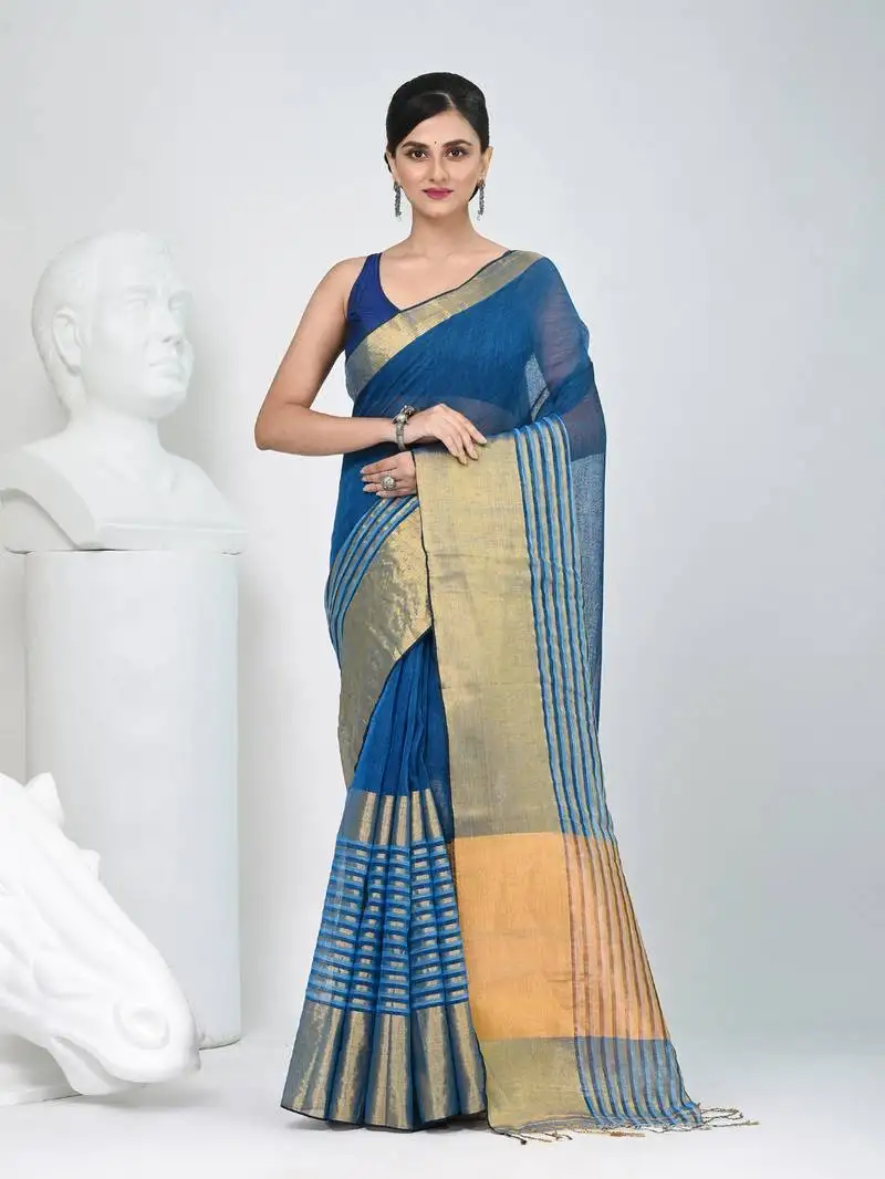 Elegant sapphire blue and gold linen saree with striped borders