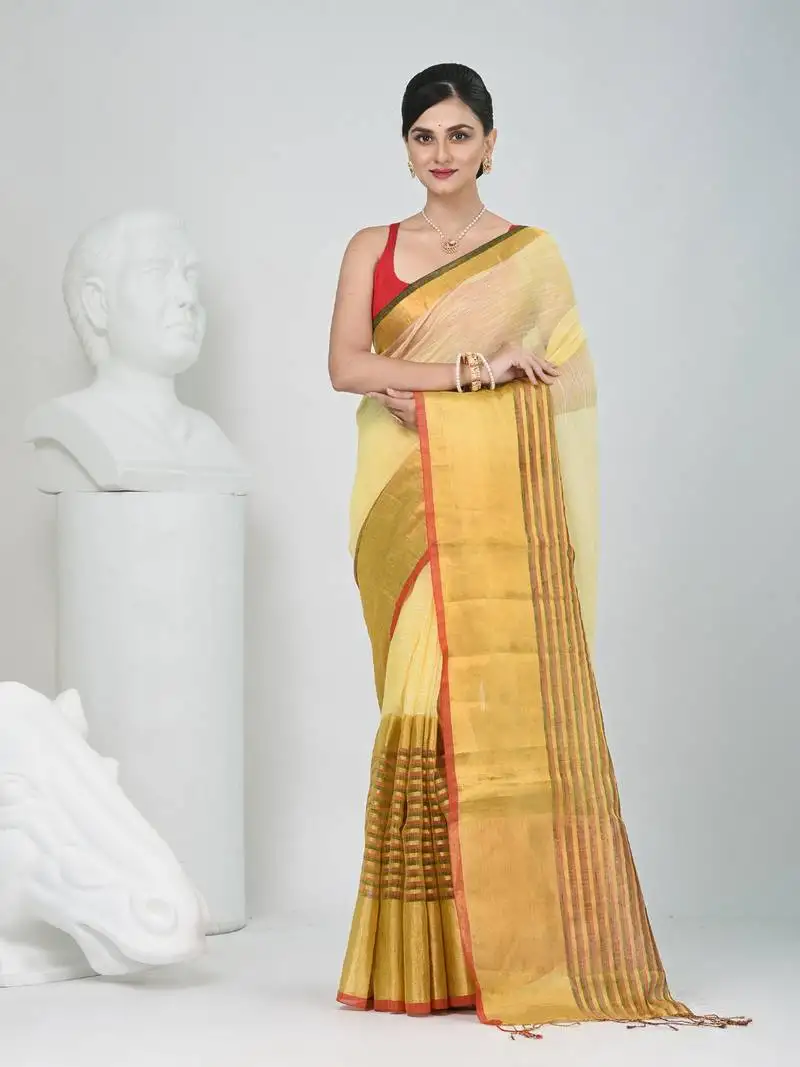 Elegant yellow and gold linen saree with striped borders