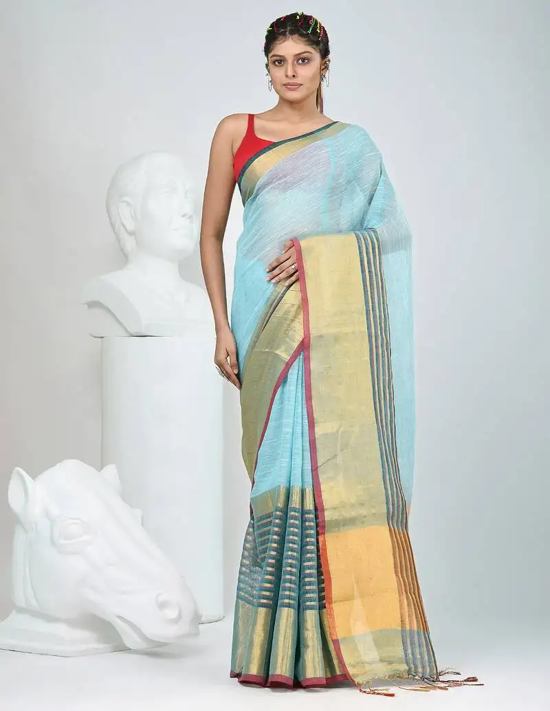 Elegant sky blue and gold linen saree with striped borders