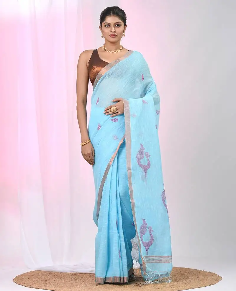 Sky blue linen saree with pink bird & texture motifs and zari borders