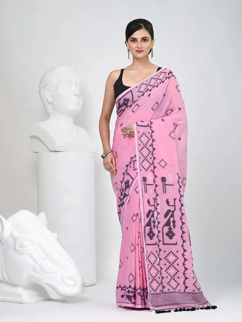 Pink cotton saree with traditional woven patterns and tassel border