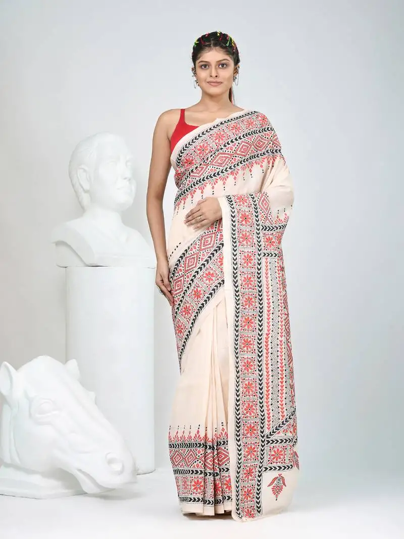 Elegant beige tussar silk kantha stitch saree with red and black geometric motifs