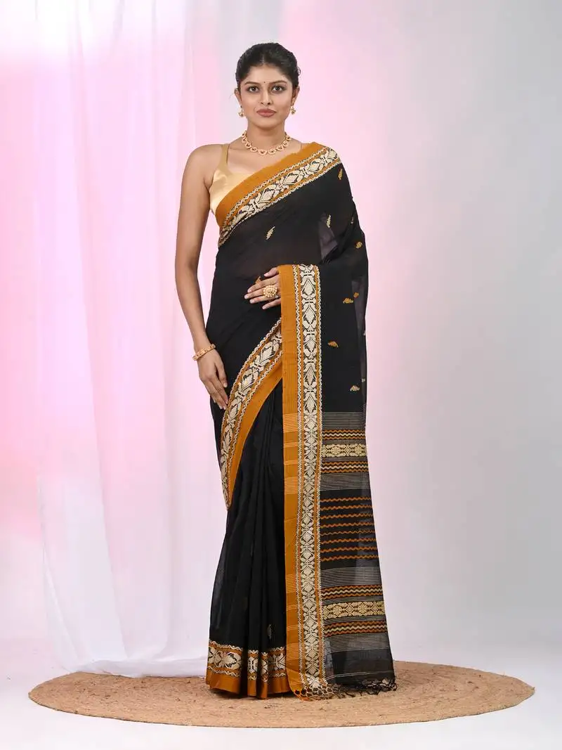 Black cotton saree with contrasting yellow border and tassels