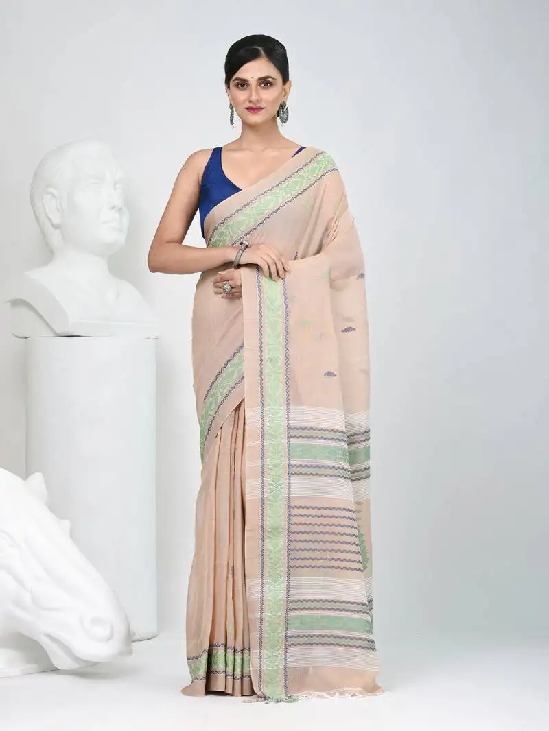 Elegant beige cotton saree with intricate border design