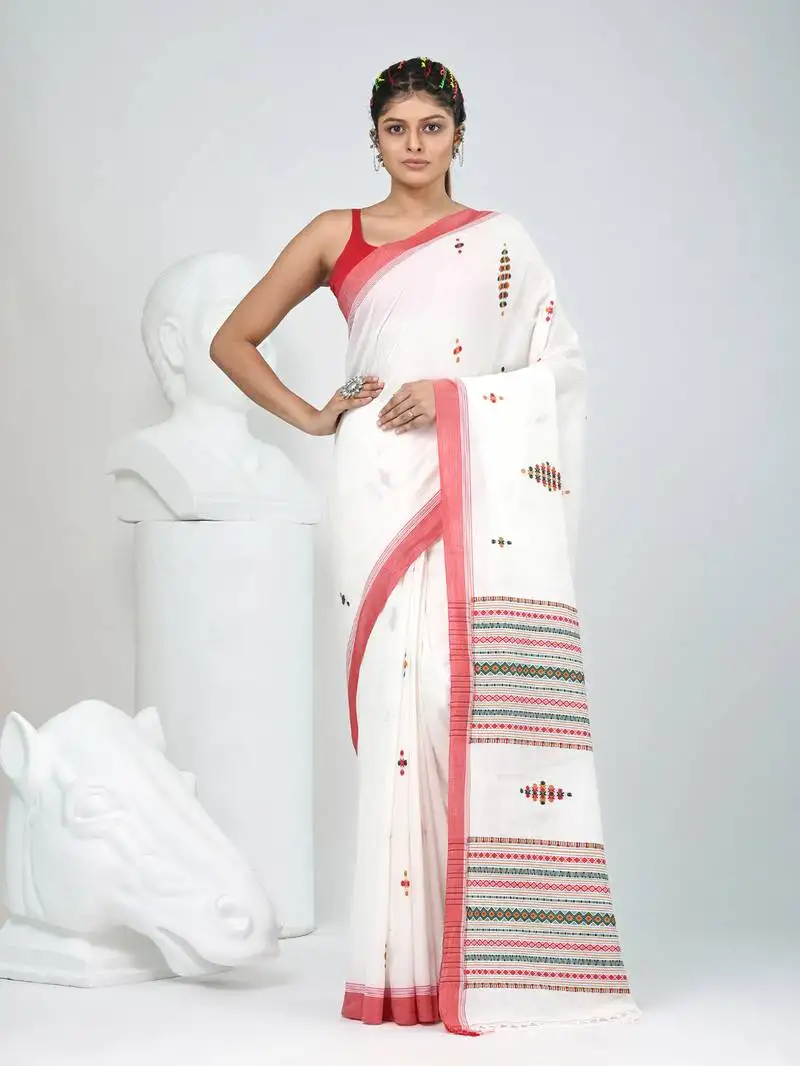 Elegant off white cotton saree with red border & woven motifs