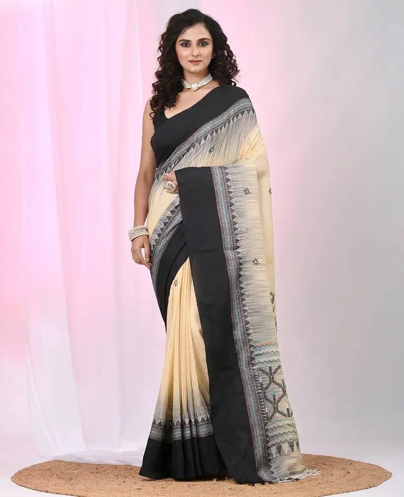 Beige and black cotton saree with traditional woven border