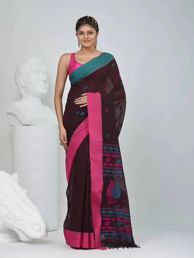 Brown cotton saree with pink and teal border & leaf design