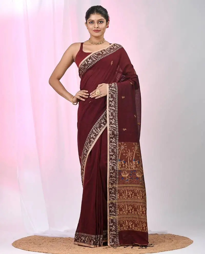 Maroon cotton saree with beige border and traditional woven pallu