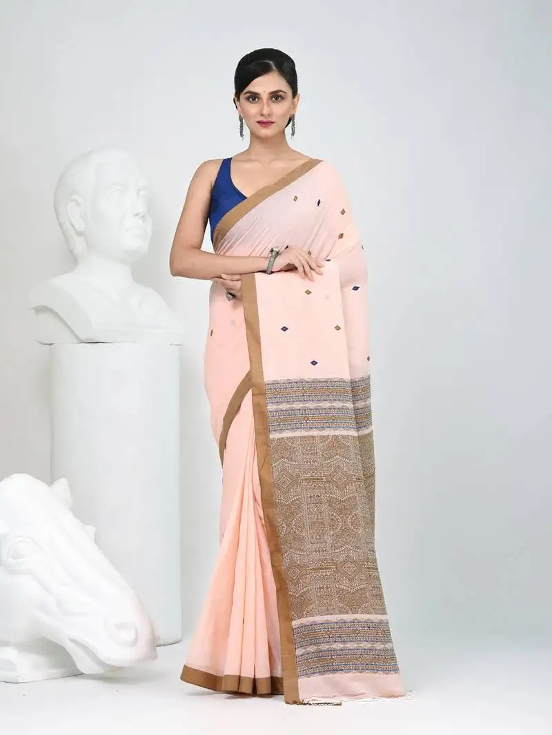 Elegant peach cotton saree with brown and black diamond motifs