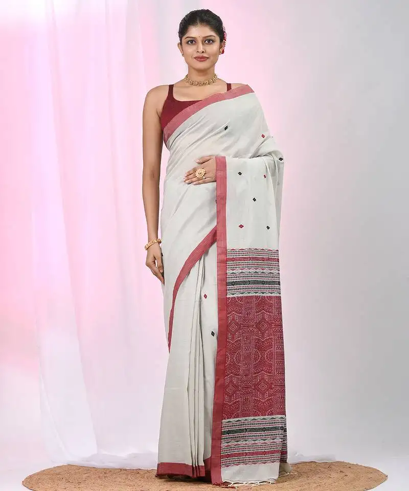 Elegant ecru cotton saree with red and green diamond motifs