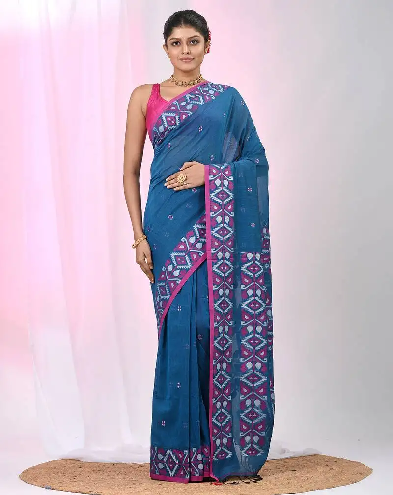 Elegant sapphire blue cotton saree with geometric floral borders