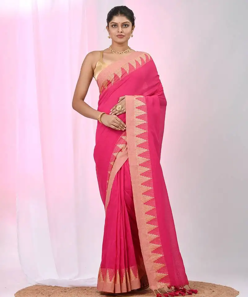 Elegant pink cotton saree with geometric border and pom pom