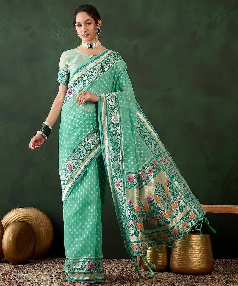 Sea green woven designer poly cotton saree with blouse piece