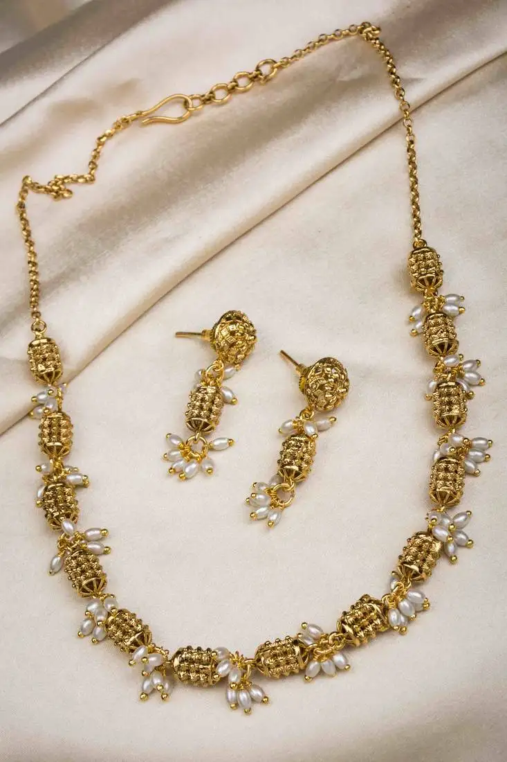 Antique finish golden beads necklace with rice pearl