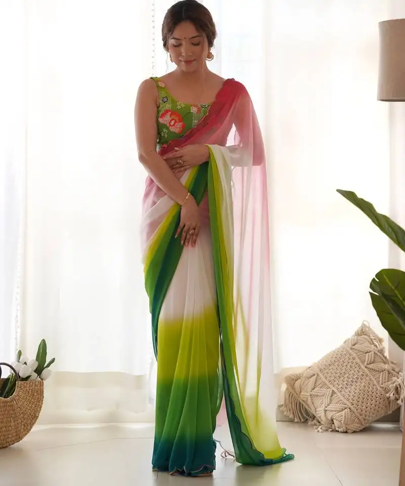 Green pedding color embroidery work faux georgette saree with blouse piece