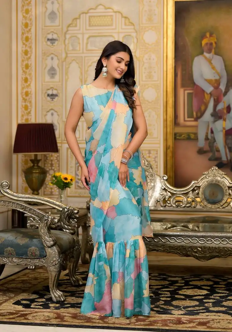 Sea green designer printed imported georgette saree with blouse piece