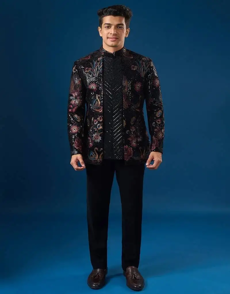 Black embroidered velvet bandhgala jacket paired with pant